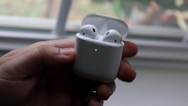 White airpods in an opened case